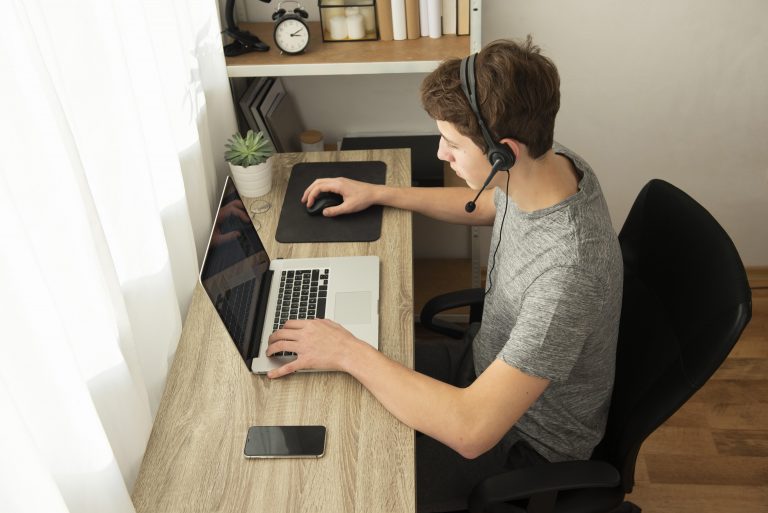 high-angle-boy-playing-online-game-with-his-friends